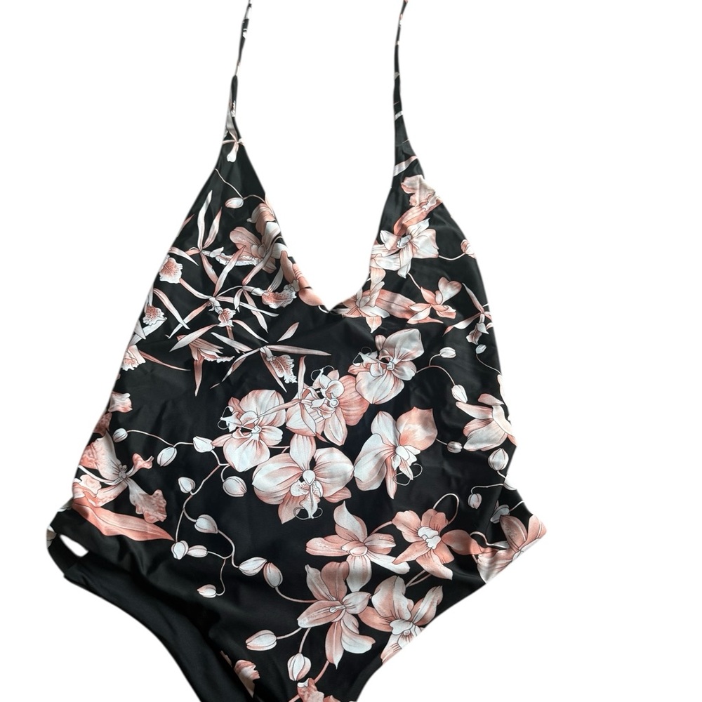 Vitamin A Black and Pink One Piece Swimwear
Size medium